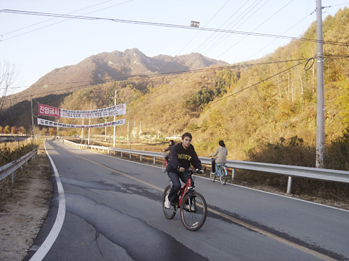 Alex Pollack rides his bike in South Korea