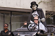 President Wagner driving Dooley in the Homecoming parade