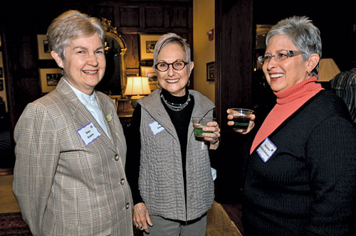 Members of the Emeritus college socializing at a party