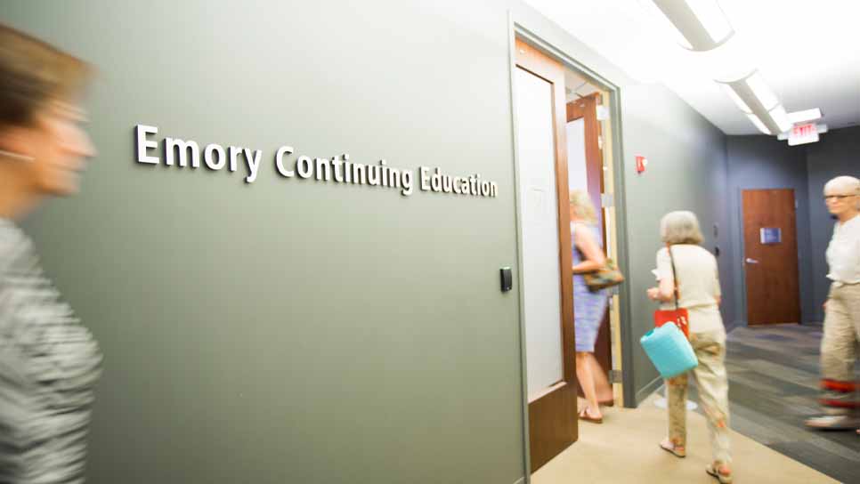 community members walking into the continuing education classroom