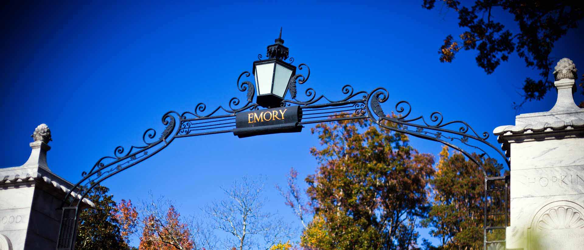 top of emory gate with deep blue sky behind