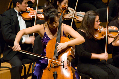 A student performing on the cello