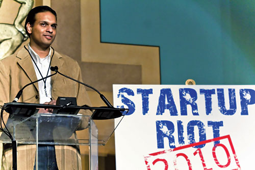 Sanjay Parekh at the podium during Startup Riot 2010