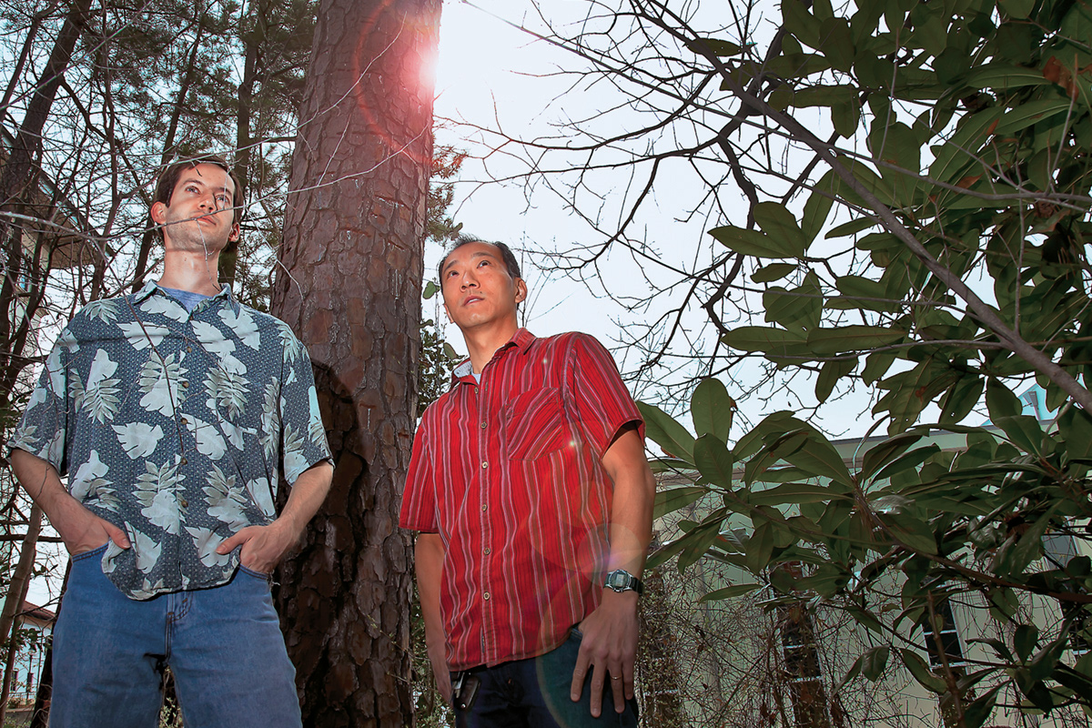 Ono and Kent standing in woods