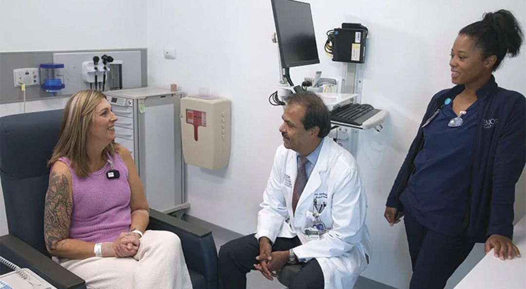 female patient talks with her care team