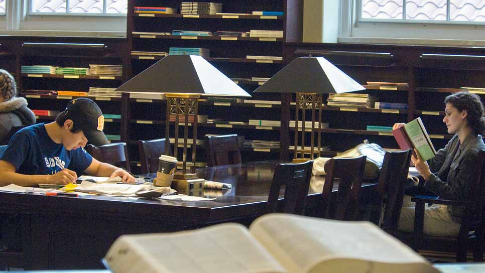 students studying in Matheson Reading Room in Emory Library