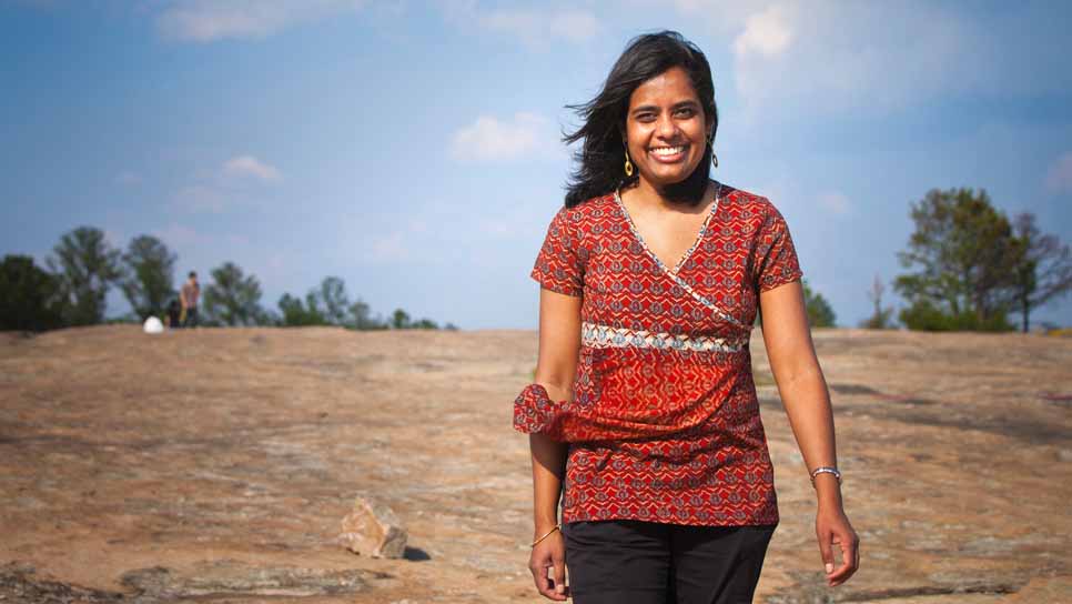 Oxford biology professor Nitya Jacobs outdoors on mountain