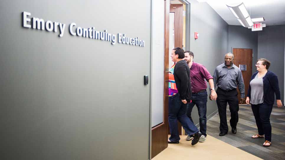 continuing education students in hallway