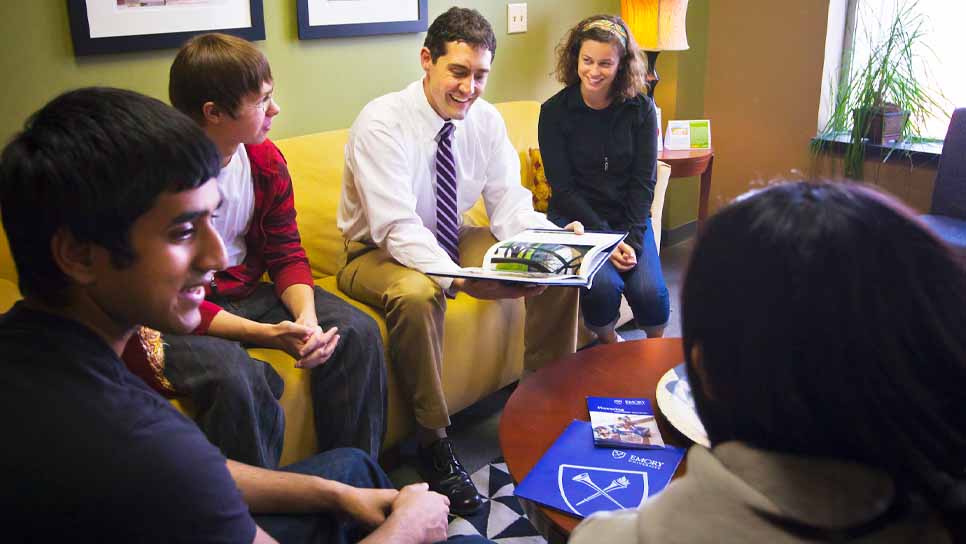 financial aid adviser talking to students