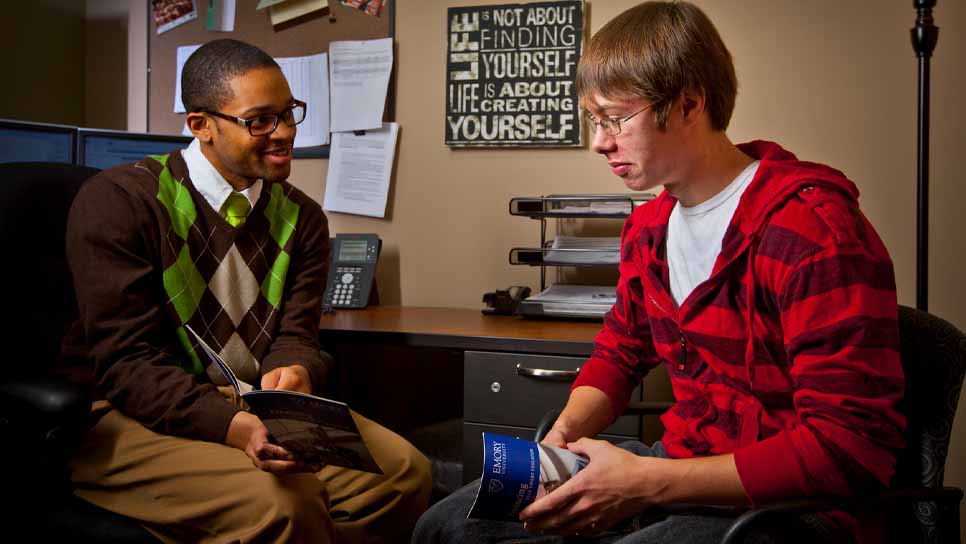 a financial aid adviser talks to a student