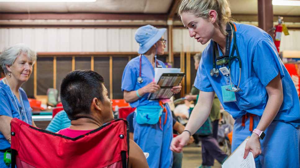 nursing students working together with patients