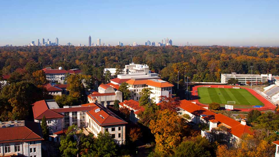 arial shot of campus with atlanta skyline