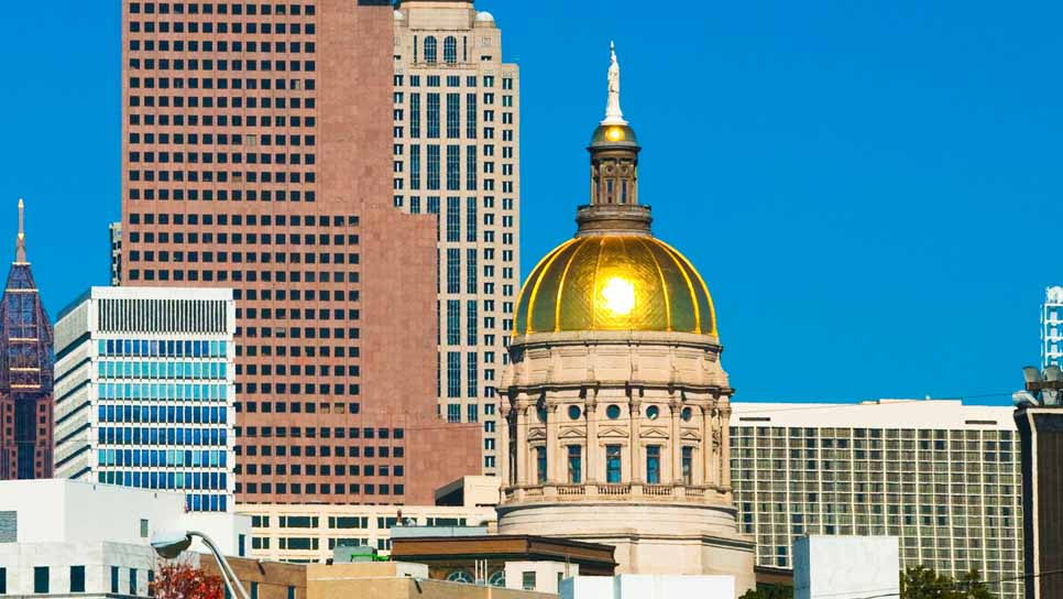 gold capitol dome in atlanta skyline