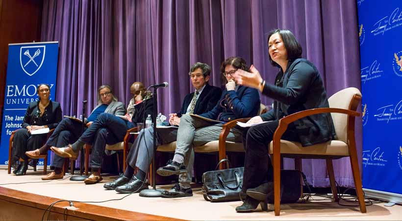 large panel of speakers on stage at jwji