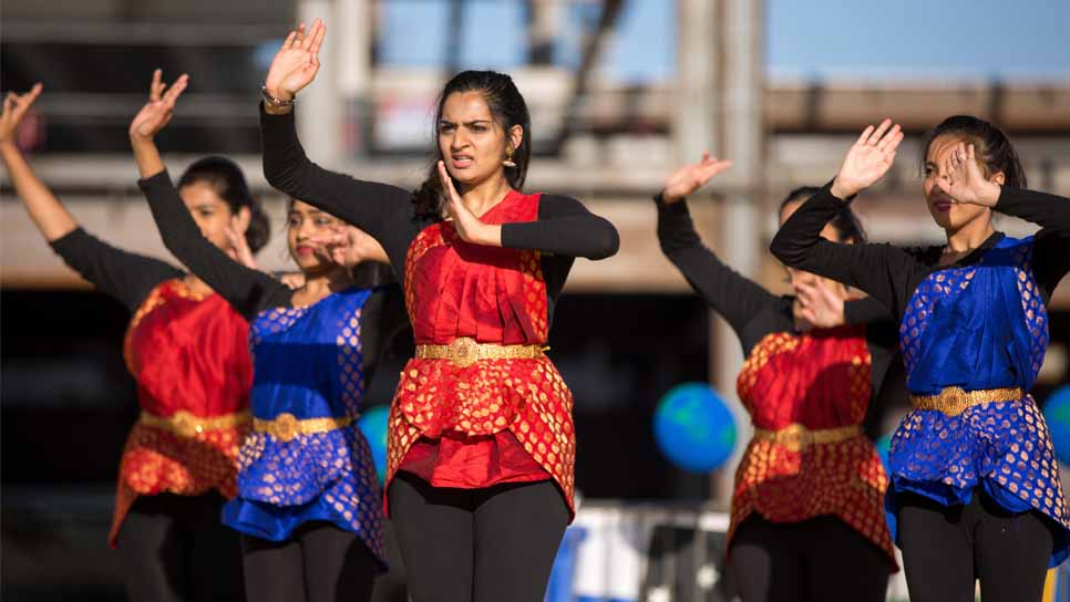 students performing international dance