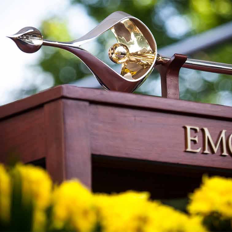 University mace on a podium during commencement