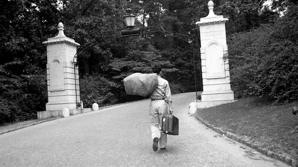 historic man with emory gate