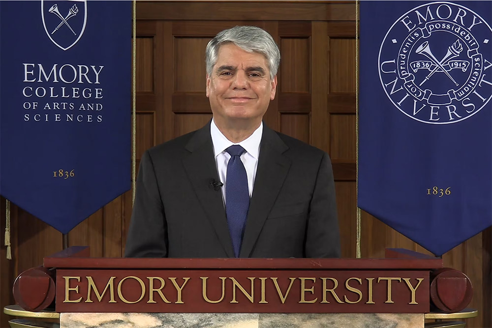 President Gregory L. Fenves stands at a podium