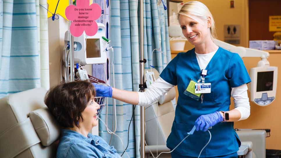 nurse taking care of patient in hospital