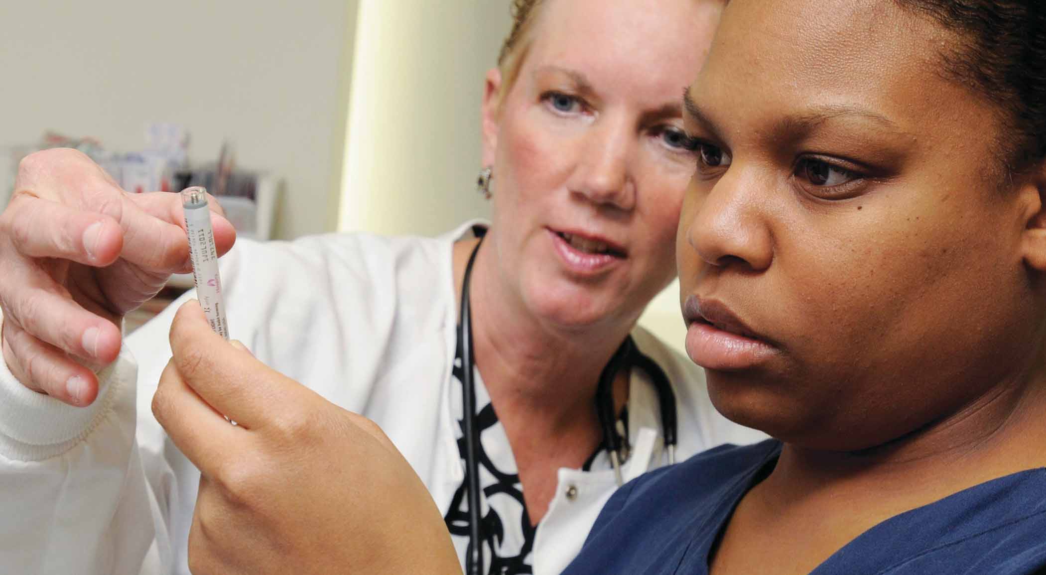 two nurses doing research