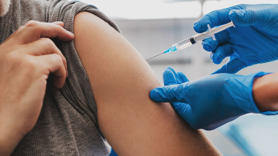 A closeup of a patient receiving a vaccine