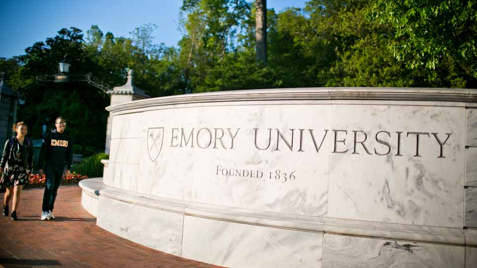 marble wall that reads emory university