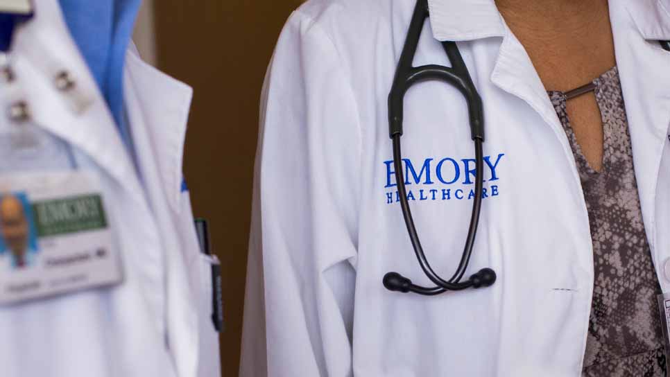 close up of doctors in white coats