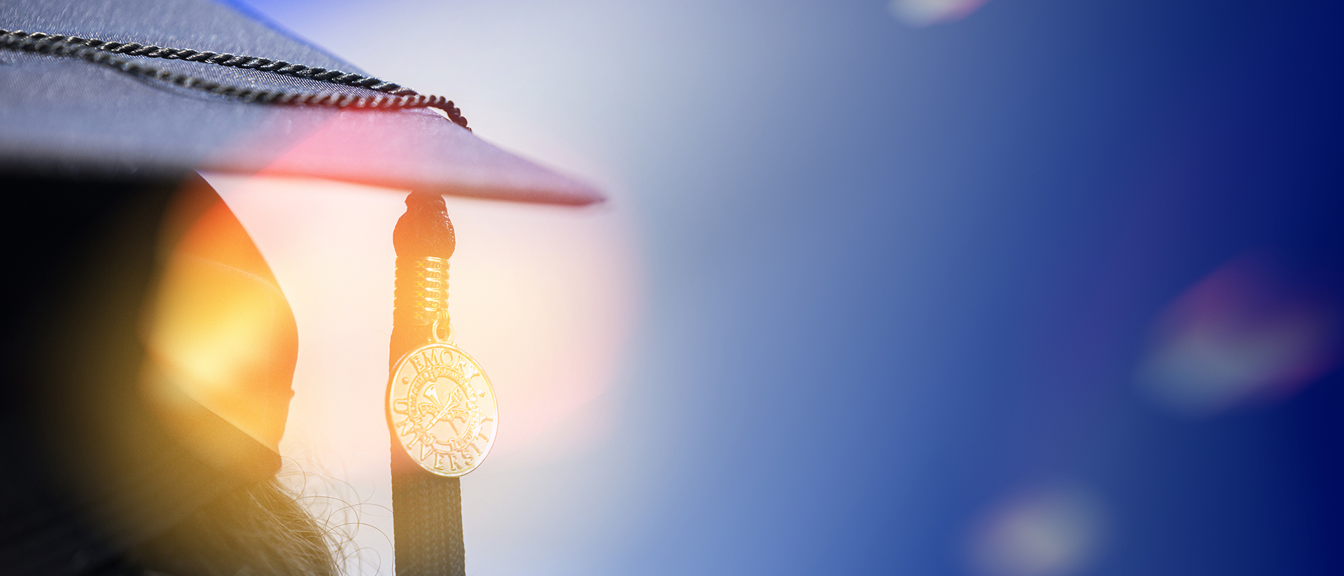 an Emory Commencement cap showing the university seal on the tassel