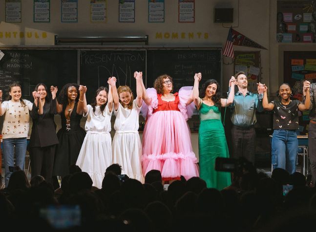 actors bowing on stage 