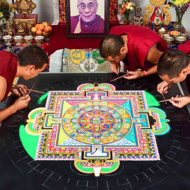 monks creating a mandala