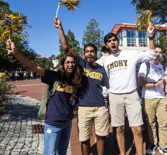 students on campus in emory branded clothing