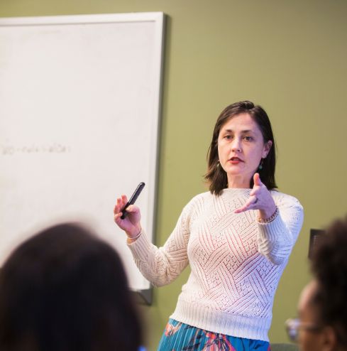 A faculty member engaging the class